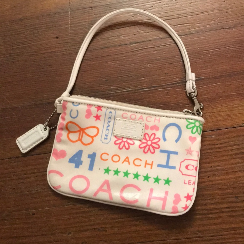 Authentic Spring Coach Wristlet